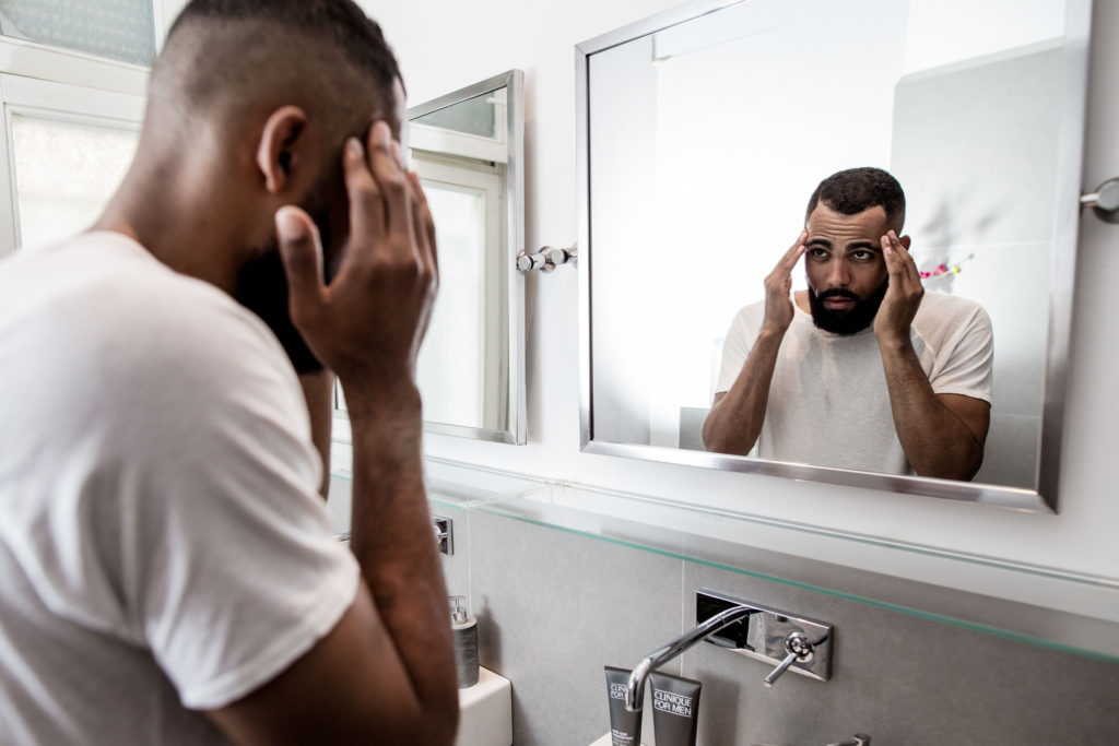 Jean-Claude Mpassy using Clinique for Men Moisturizer