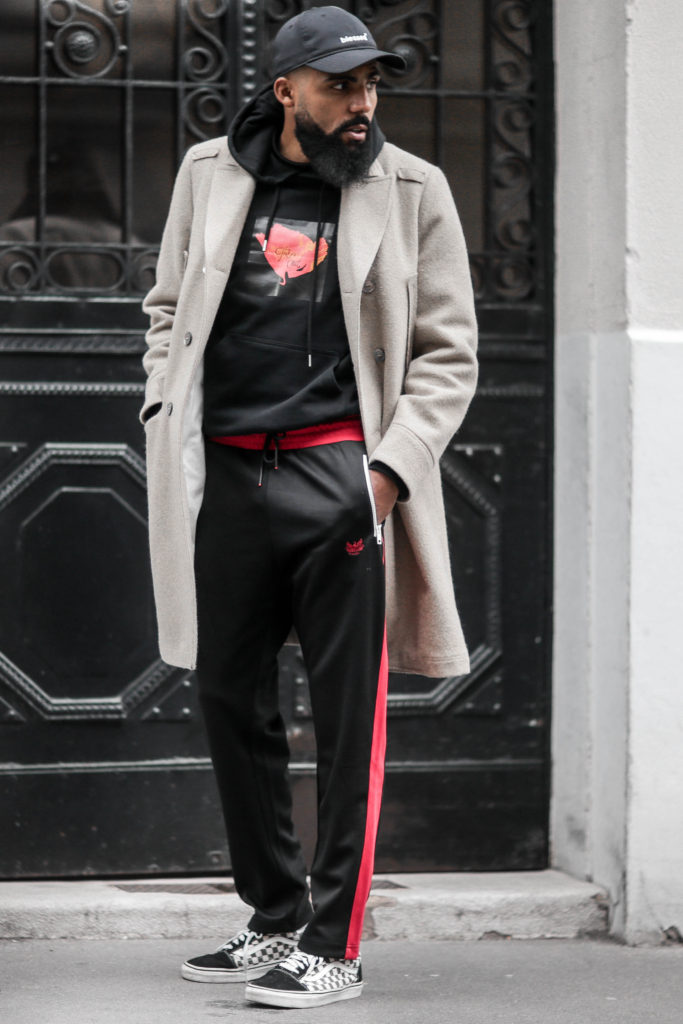 Blogger Jean-Claude Mpassy wearing Diesel sweatpants, Soulland hoodie and Delikatessen coat
